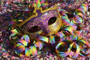 <img src="mask.jpg" alt="multicolored mask for carnival">