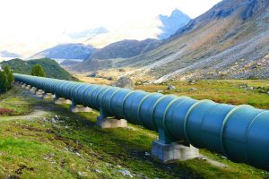 <img src="pipeline.jpg" alt="pipeline and mountain">